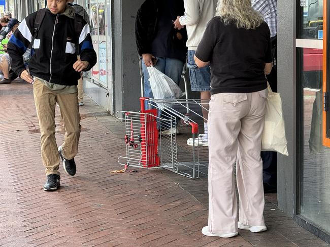 Discarded shopping trolleys left at a bus stop on The Mall, Bankstown, on Tuesday. Picture: Canterbury-Bankstown Express