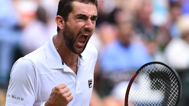 Croatia's Marin Cilic reacts after breaking the serve of US player Sam Querrey in the second set of their men's singles semi-final match.