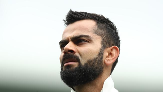 SYDNEY, AUSTRALIA - NOVEMBER 29: Virat Kohli of India walks off at lunch during day two of the four day International Tour Match between the Cricket Australia XI and India at Sydney Cricket Ground on November 29, 2018 in Sydney, Australia. (Photo by Mark Metcalfe/Getty Images)