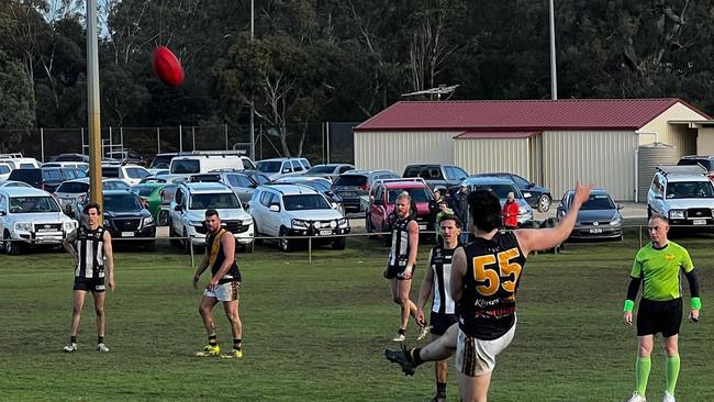 Jack Stafford kicks the winning goal for Lobethal in the club's extra time grand final victory. Picture: Lobethal Football Club