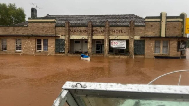 A canoe rests at the second storey of the The Northern Rivers Hotel during record floods in North Lismore on February 28.