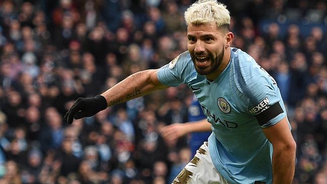 Manchester City's Argentinian striker Sergio Aguero celebrates scoring his team's third goal during the English Premier League football match between Manchester City and Burnley at the Etihad Stadium in Manchester, north west England, on February 10, 2019. (Photo by Oli SCARFF / AFP) / RESTRICTED TO EDITORIAL USE. No use with unauthorized audio, video, data, fixture lists, club/league logos or 'live' services. Online in-match use limited to 120 images. An additional 40 images may be used in extra time. No video emulation. Social media in-match use limited to 120 images. An additional 40 images may be used in extra time. No use in betting publications, games or single club/league/player publications. /