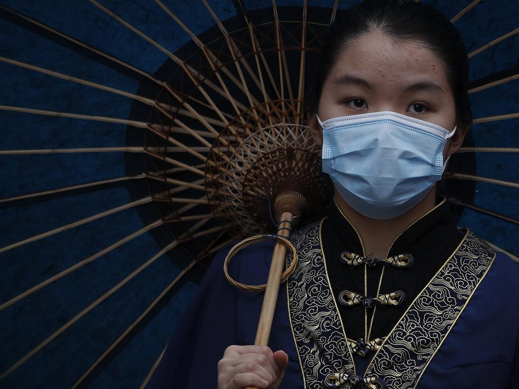 Experts believe face masks could create an inflated sense of security among passengers. Picture: Andy Wong/AP