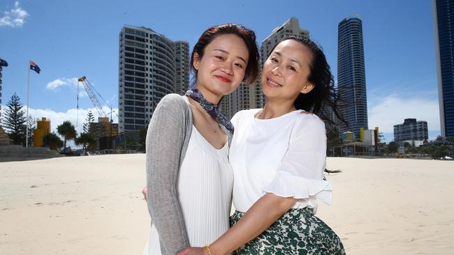 Chinese Tourists Qiqi Si and Nana Chao enjoy time on Surfers Paradise Beach. They were among hundreds of thousands who used to visit the city annually. Picture: Adam Head