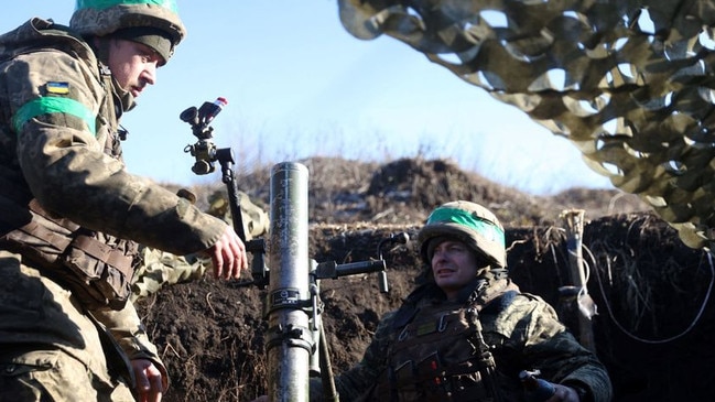 Ukrainian soldiers near Bakhmut, Ukraine, on Friday. Ukrainians said they were outnumbered and outgunned. Picture: Anatolii Stepanov/AFP/Getty Images/WSJ