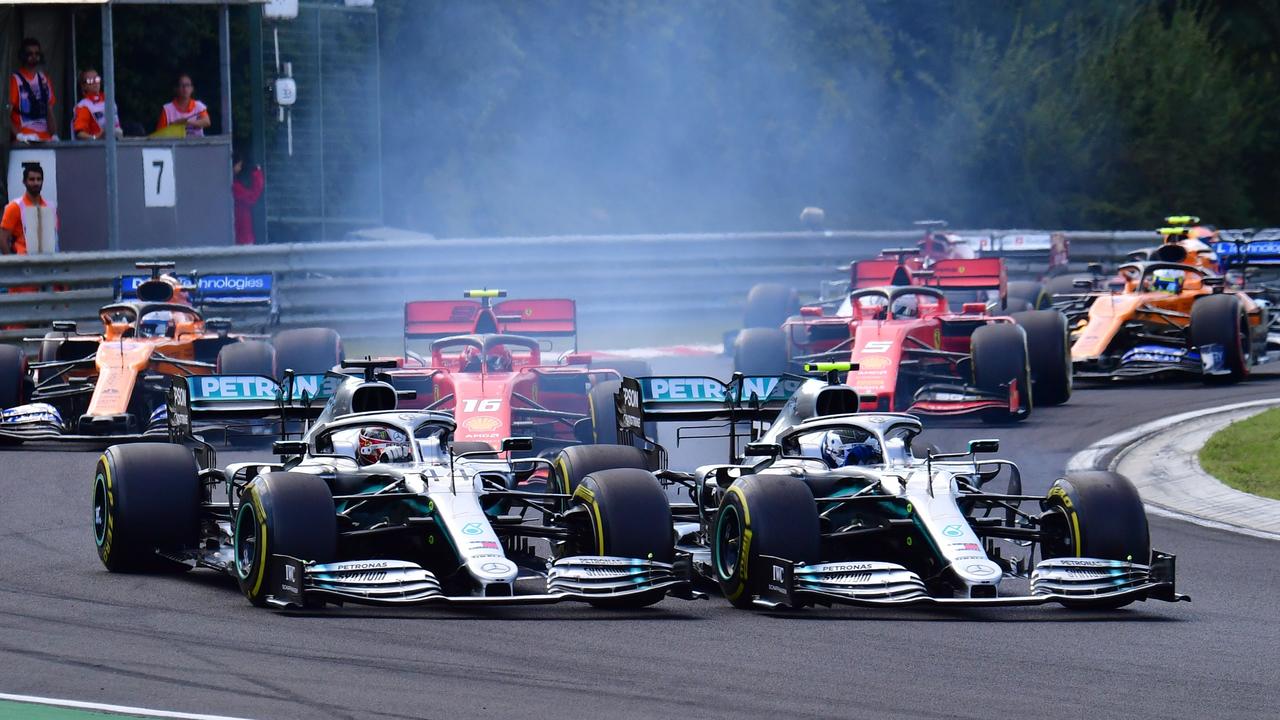 Hamilton (L) and Bottas battle at Turn 2 before it all went wrong for No. 77.