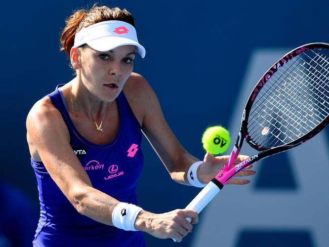 Agnieszka Radwanska of Poland returns a shot to Barbora Strycova of the Czech Republic during their Semi Final match at the Sydney International Tennis Tournament, in Sydney, Thursday, Jan. 12, 2017. (AAP Image/Dan Himbrechts) NO ARCHIVING, EDITORIAL USE ONLY