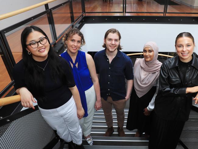 3/12/21: News Corp Australia cadets..L to R..Joanne Tran, Madeleine Bower, Sam King, Amaani Siddeek and Tamaryn McGregor. John Feder/The Australian.