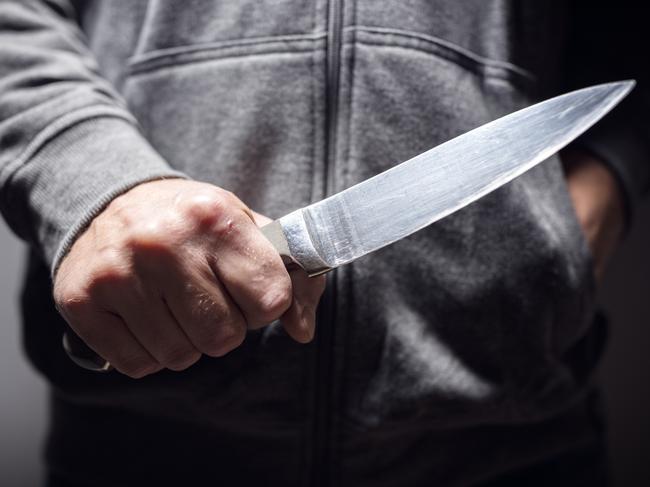 Generic crime Istock  -  Criminal with knife weapon threatening to stab