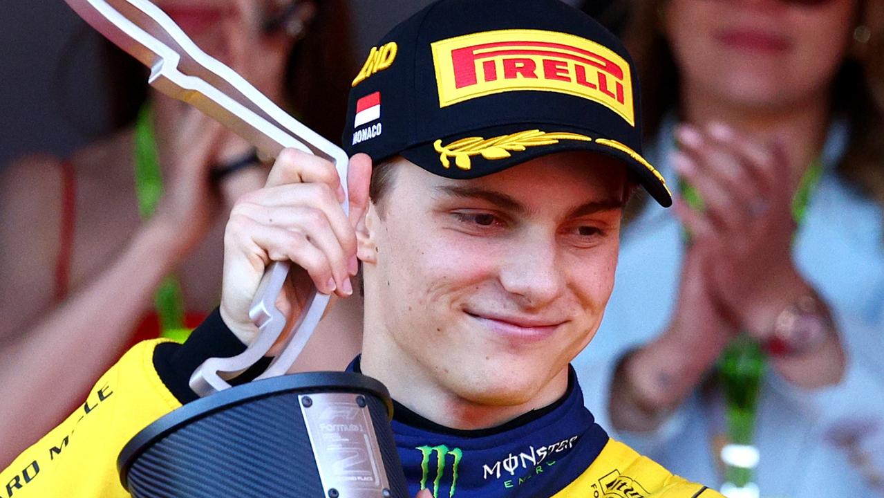 MONTE-CARLO, MONACO - MAY 26: Second placed Oscar Piastri of Australia and McLaren celebrates on the podium during the F1 Grand Prix of Monaco at Circuit de Monaco on May 26, 2024 in Monte-Carlo, Monaco. (Photo by Clive Rose/Getty Images)