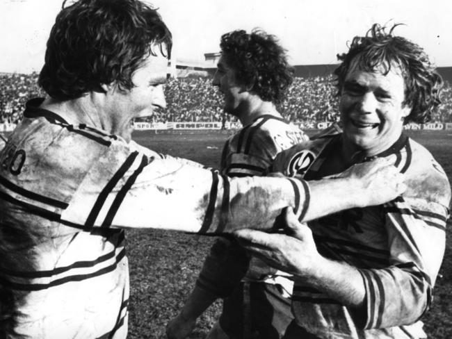 Bob Fulton (right) celebrates Manly's 1976 Grand Final win with Tom Mooney.