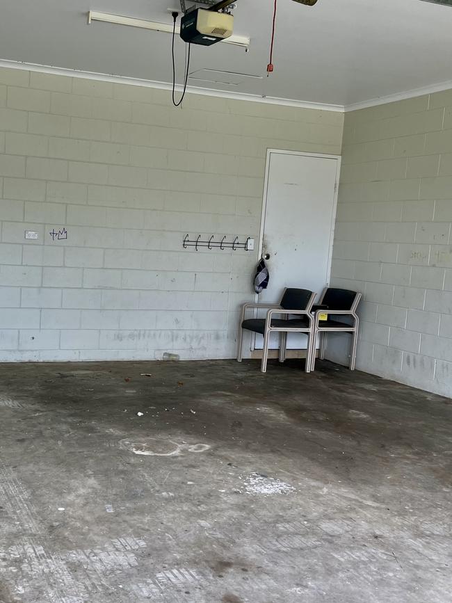 The empty garage at the Bentley Park house. Picture: Peter Carruthers