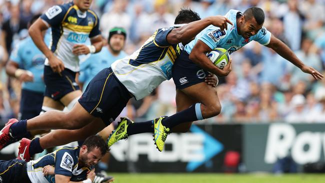 Waratahs Kurtley Beale makes a break during the NSW Waratahs v ACT Brumbies Super Rugby game at Allianz Stadium, Sydney. Pic Brett Costello