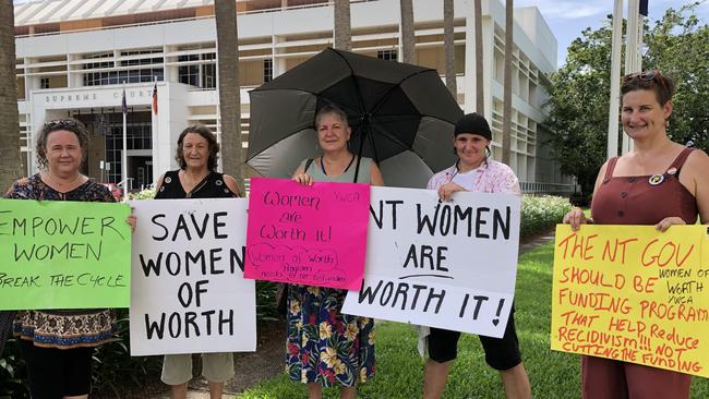 Sally Endemann, Case Pearson, Katherine Marchment, Rocket Bretherton and Noelene Armstrong protesting funding cuts to the Women of Worth program. Picture: Madura McCormack