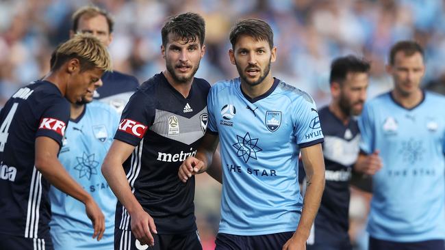 Terry Antonis (L) and Milos Ninkovic jostle during the Big Blue. Picture: Getty