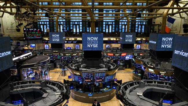 Traders on the floor of the New York Stock Exchange. Picture: Angela Weiss/ AFP