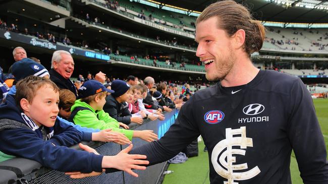 Bryce Gibbs celebrates a win with Blues fans. Photo: Michael Dodge/Getty Images