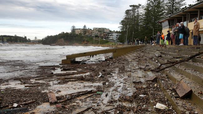 There is very little sand left on Terrigal beach after the weekend’s major storm activity. Picture: Mark Scott