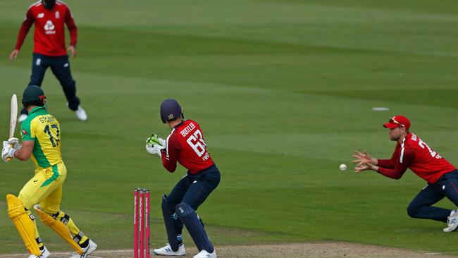 Dawid Malan held this chance to send Marcus Stoinis on his way. Picture: AFP Photo