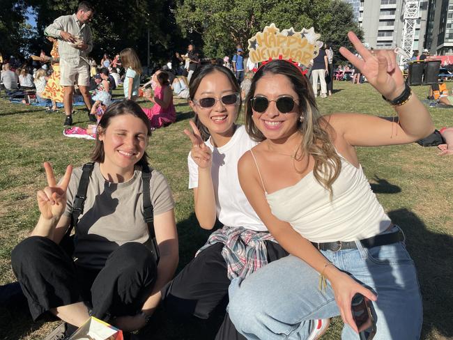 Noe, Nagi, and Juanita at Flagstaff Gardens in the Melbourne CBD for the 2024 New Year's Eve fireworks. Picture: Himangi Singh