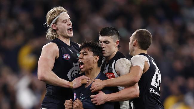 MELBOURNE, AUSTRALIA – JULY 28: Jesse Motlop of the Blues celebrates a goal during the round 20 AFL match between Collingwood Magpies and Carlton Blues at Melbourne Cricket Ground, on July 28, 2023, in Melbourne, Australia. (Photo by Darrian Traynor/Getty Images)