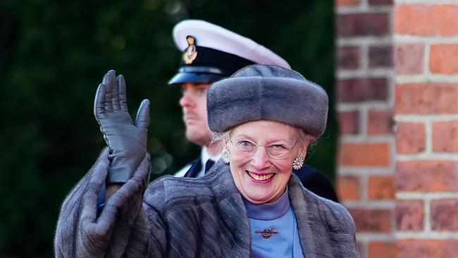 Queen Margrethe II of Denmark waves after visiting the tomb of her father. Picture: AFP.