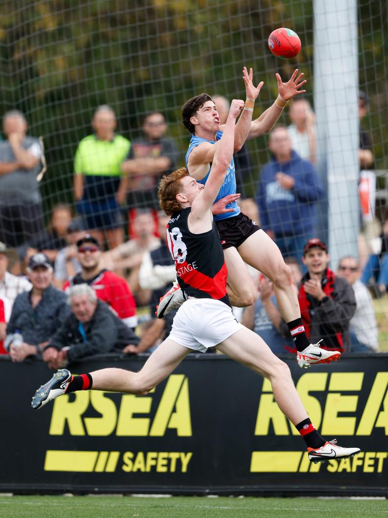 Darcy Wilson and Lewis Hayes compete for the ball in flight. Running machine Wilson is in line for an early debut. Picture: Dylan Burns/AFL Photos via Getty Images.