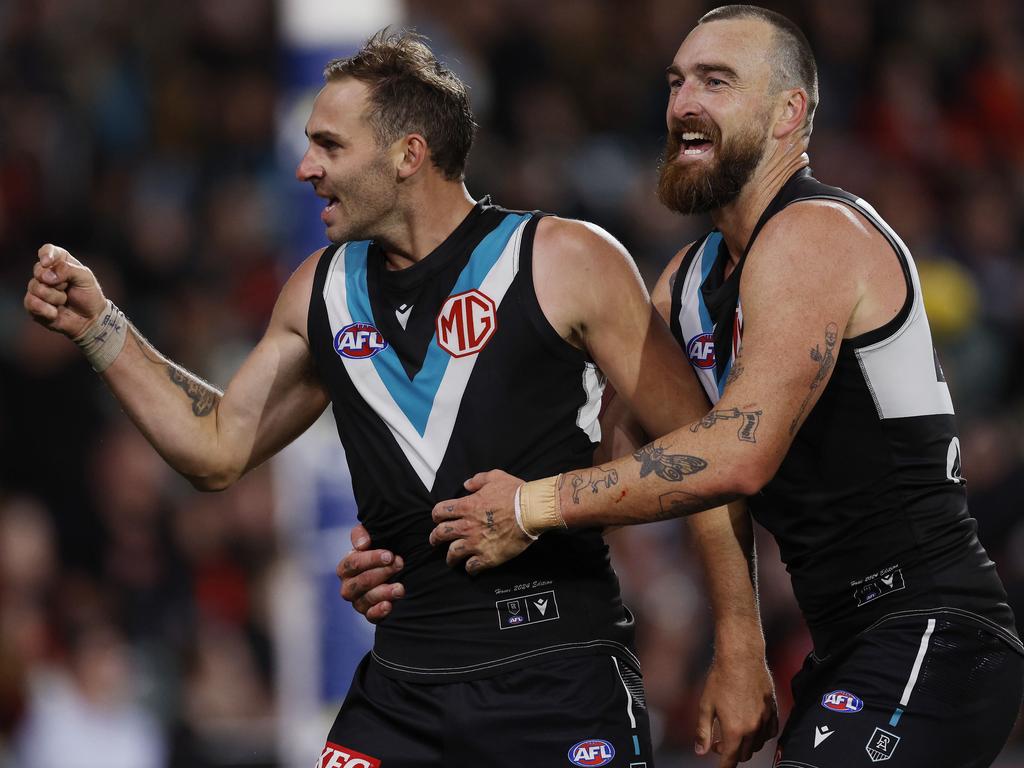 MELBOURNE , AUSTRALIA. April 5, 2024.  AFL Gather Round. Round 4.  Port Adelaide vs Essendon at the Adelaide Oval.   Jeremy Finlayson of the Power celebrates a 4th quarter goal with Charlie Dixon   . Pic: Michael Klein