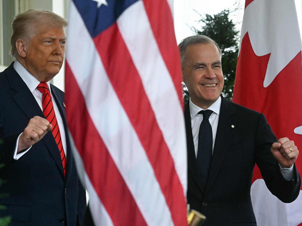 US President Donald Trump greets Canadian Prime Minister Mark Carney as he arrives at the White House in Washington, DC, on May 6, 2025. Picture: AFP