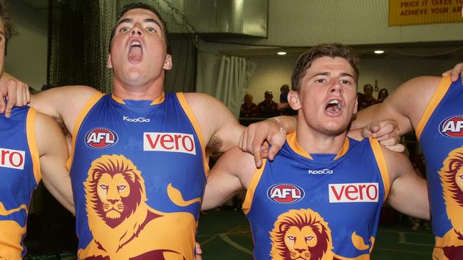 Tom Rockliff and Dayne Zorko celebrate a Lions win. Picture: Jono Searle