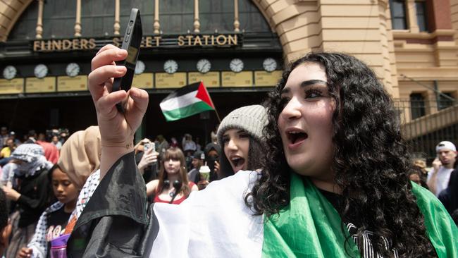 Hundreds of students turned out near Flinders St station in Melbourne’s CBD in support of Palestine. Picture: NCA NewsWire / Nicki Connolly