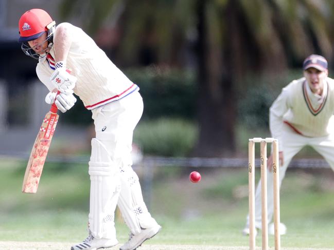 Footscray's Travis Dean clips a ball to the leg side.