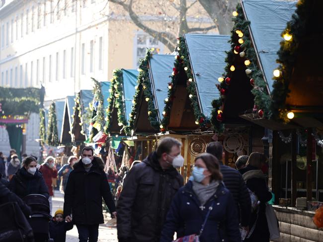 A Christmas shopping street in Bonn, Germany. Authorities have announced limited restrictions to go into effect on December 28 to slow the spread of the Omicron variant. Picture: Getty Images