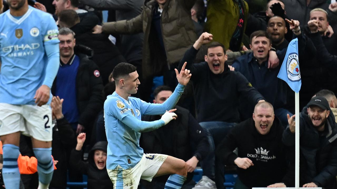 Manchester City's English midfielder #47 Phil Foden celebrates after scoring their second goal during the English Premier League football match between Manchester City and Manchester United at the Etihad Stadium in Manchester, north west England, on March 3, 2024. (Photo by Paul ELLIS / AFP)