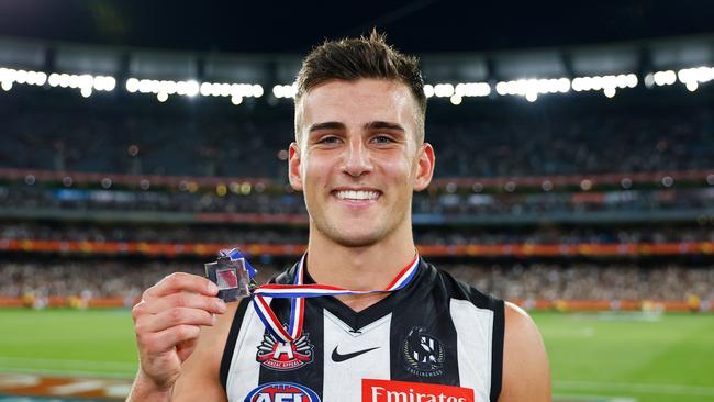 MELBOURNE, AUSTRALIA - APRIL 25: Nick Daicos of the Magpies poses for a photo after winning the Anzac medal during the 2023 AFL Round 06 match between the Collingwood Magpies and the Essendon Bombers at the Melbourne Cricket Ground on April 25, 2023 in Melbourne, Australia. (Photo by Dylan Burns/AFL Photos via Getty Images)