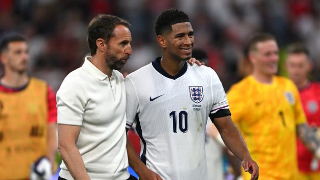 Gareth Southgate embraces Jude Bellingham after the draw with Denmark. (Photo by Stu Forster/Getty Images)