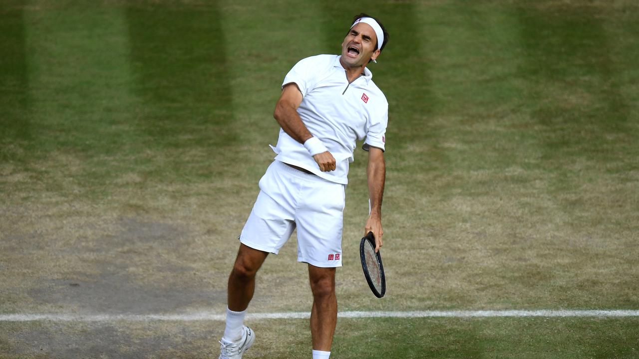 Roger Federer celebrates match point against Rafael Nadal.