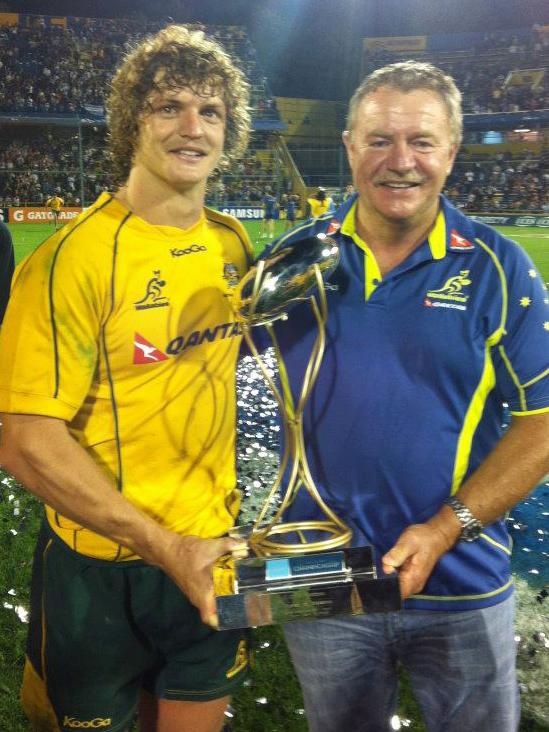 Wallaby star Nick Cummins pictured with his father Mark Cummins. Facebook