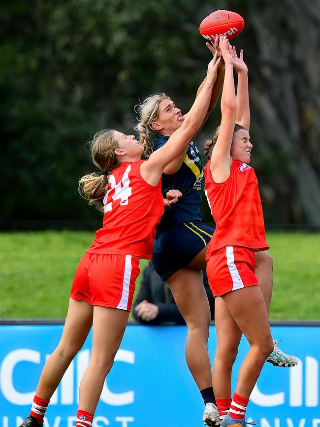 Alexis Gregor (left) goes up for the contest against Havana Harris and Scout Howden in an AFL Academy v All Stars game. Picture: Josh Chadwick/AFL Photos/via Getty Images