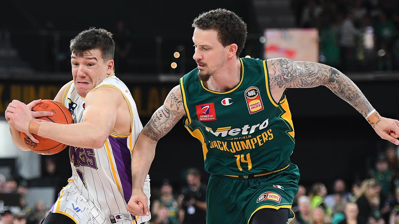 HOBART, AUSTRALIA - MAY 08: Dejan Vasiljevic of the Kings drives to the basket past Josh Adams of the Jackjumpers during game two of the NBL Grand Final series between Tasmania Jackjumpers and Sydney Kings at MyState Bank Arena on May 08, 2022 in Hobart, Australia. (Photo by Steve Bell/Getty Images)