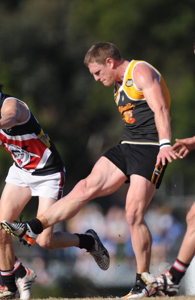 Lew Roberts takes a kick for YCW.