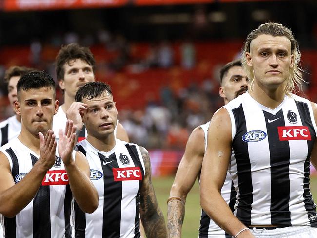 Collingwood's Nick Daicos and Darcy Moore leave the field during the AFL Opening Round match between the GWS Giants and Collingwood Magpies at Engie Stadium, Sydney on March 9, 2024. Photo by Phil Hillyard (Image Supplied for Editorial Use only – Phil Hillyard **NO ON SALES** – Â©Phil Hillyard )