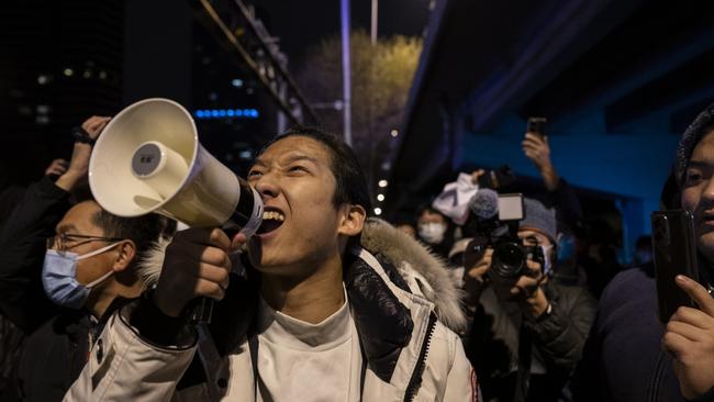 A protesters shouts slogans during a protest against China’s strict zero Covid measures on November 28, 2022 in Beijing, China. Picture: Kevin Frayer/Getty Images.