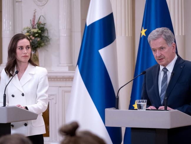 Finland’s Prime Minister Sanna Marin (L) and President Sauli Niinisto announce Finland’s bid for NATO membership as Russia warns this will trigger a response. Picture: AFP