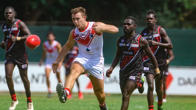 Joshua Saltalamacchia kicks clear against the Tiwi Bombers. Picture: Glenn Campbell