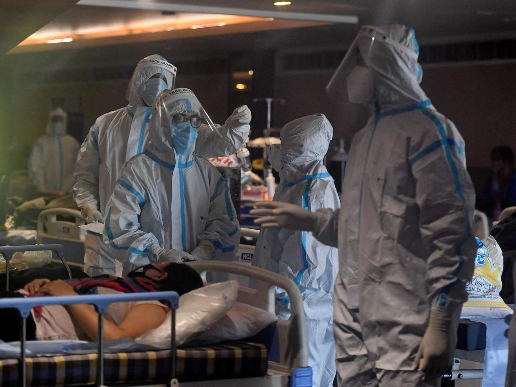 Health workers inside a banquet hall temporarily converted into a COVID care centre in New Delhi. Picture: Tauseef Mustafa