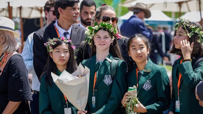 Students from Oatlands Public School eagerly await the Royal couple. Photo by Brook Mitchell / POOL / AFP