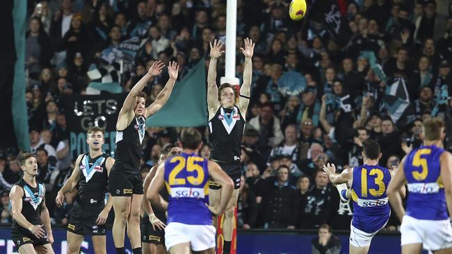 Luke Shuey kicks the winning goal after the siren in extra time. Picture: Sarah Reed