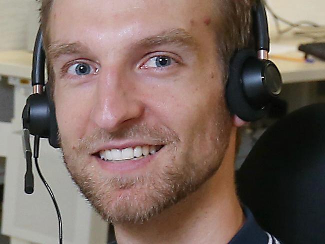 The Emergency Services Telecommunications Call Centre.Call-taker Nick Buruma ( ambulance ) is pictured in the ESTA Burwood East offices. Picture : Ian Currie