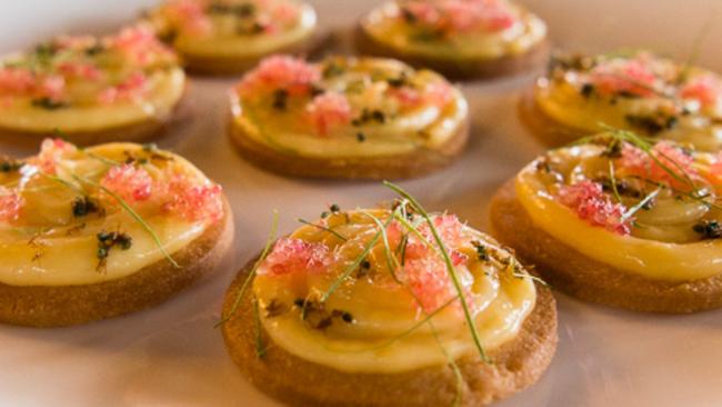 Lemon and lime tarts — seasoned with green tree ants. Picture: Jen Dainer/Industrial Arc Photography